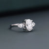 2.20 CT Oval Lab-Grown Diamond Engagement Ring with Pear Side Diamonds