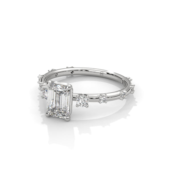 1.25 CT Emerald Cut Lab-Grown Diamond Ring with Round Side Accents
