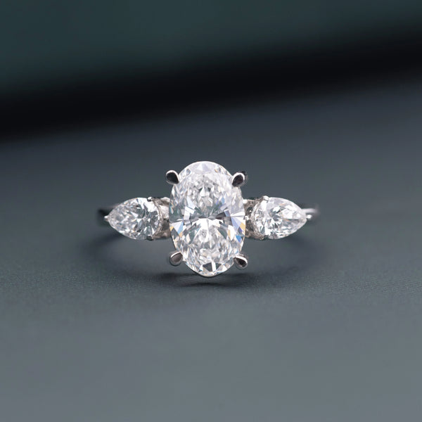 2.20 CT Oval Lab-Grown Diamond Engagement Ring with Pear Side Diamonds