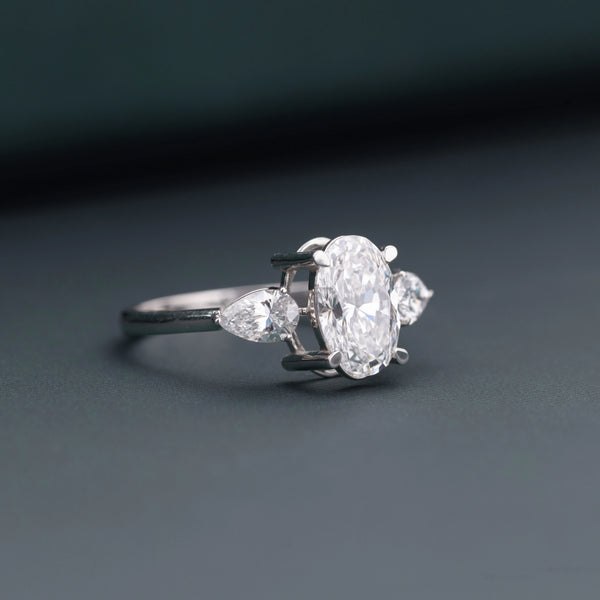 2.20 CT Oval Lab-Grown Diamond Engagement Ring with Pear Side Diamonds